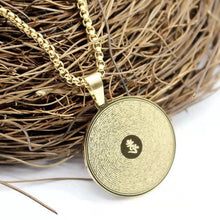 Load image into Gallery viewer, Golden Tibetan Sigil - Wealth &amp; Protection Pendant
